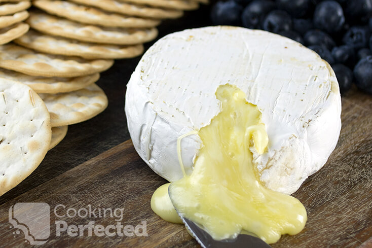 Gooey Baked Brie with Fruit and Crackers