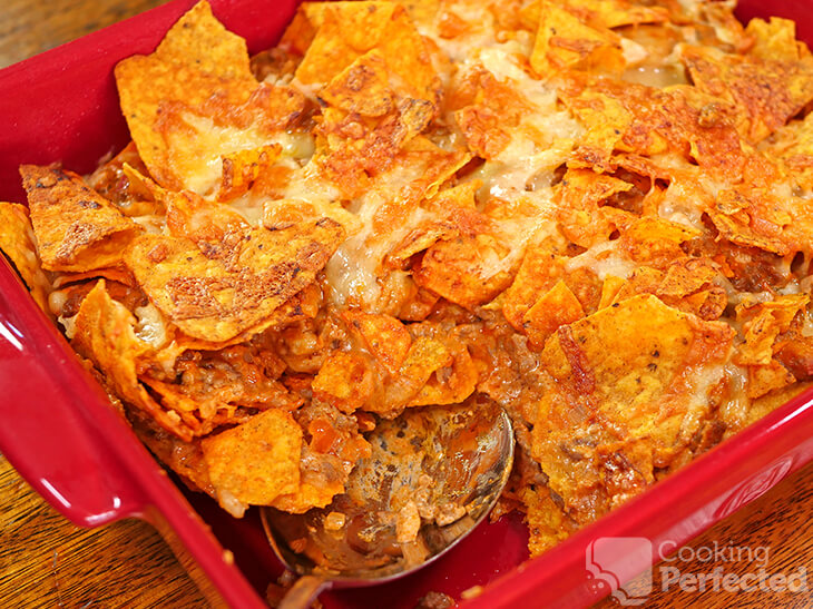 Oven-baked Dorito casserole with cheese and taco beef