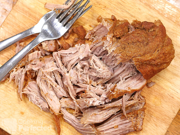 Pressure Cooker Pulled Pork on a Wooden Board