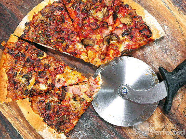 Air Fryer Frozen pizza cut and served into equal portions