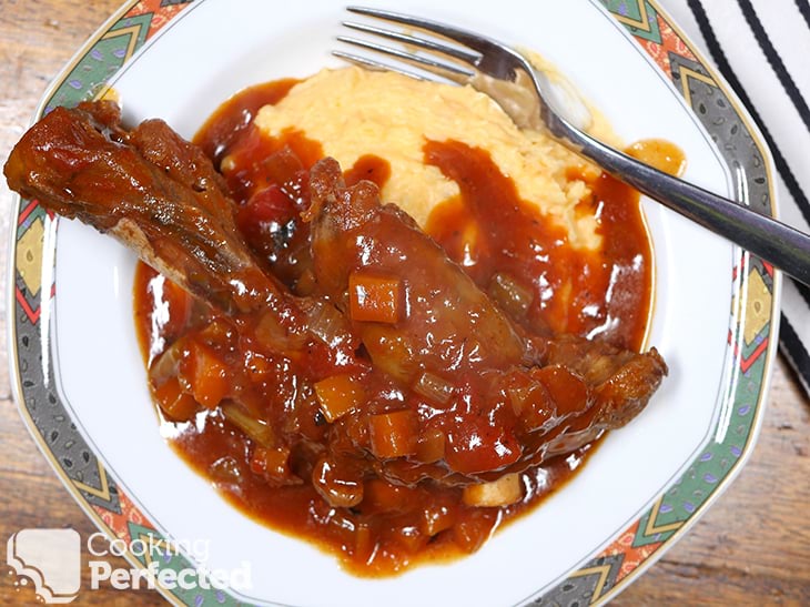 Lamb shanks served with mashed potato