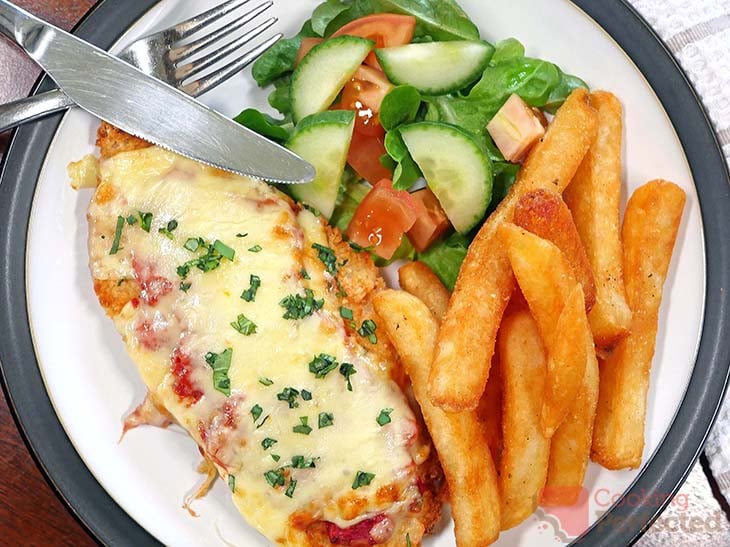 Chicken Parm cooked in the Air Fryer and served with Salad and Fries