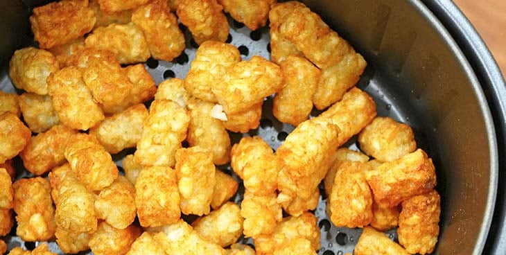 Frozen Tater Tots Cooking in the Air Fryer