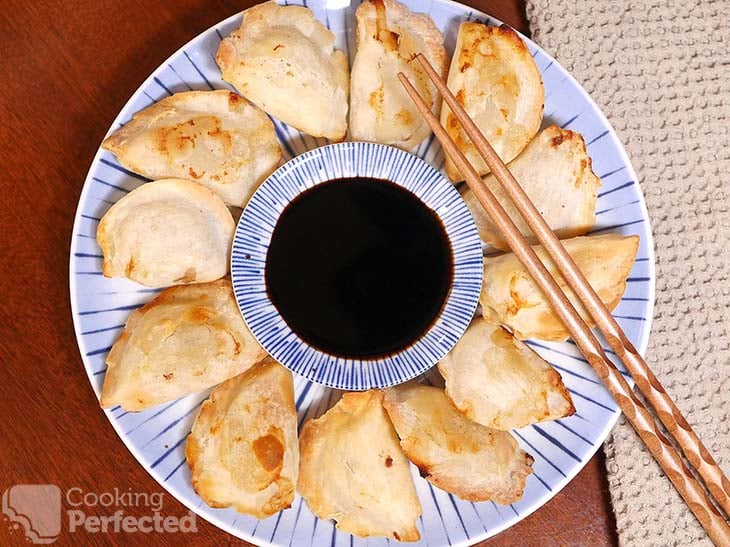 Air-fried frozen potstickers on a plate