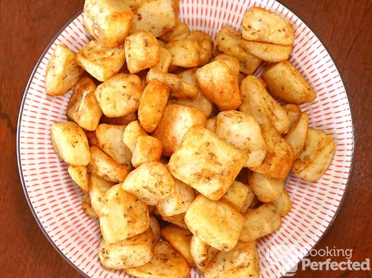 Air-fried frozen roast potatoes in a bowl