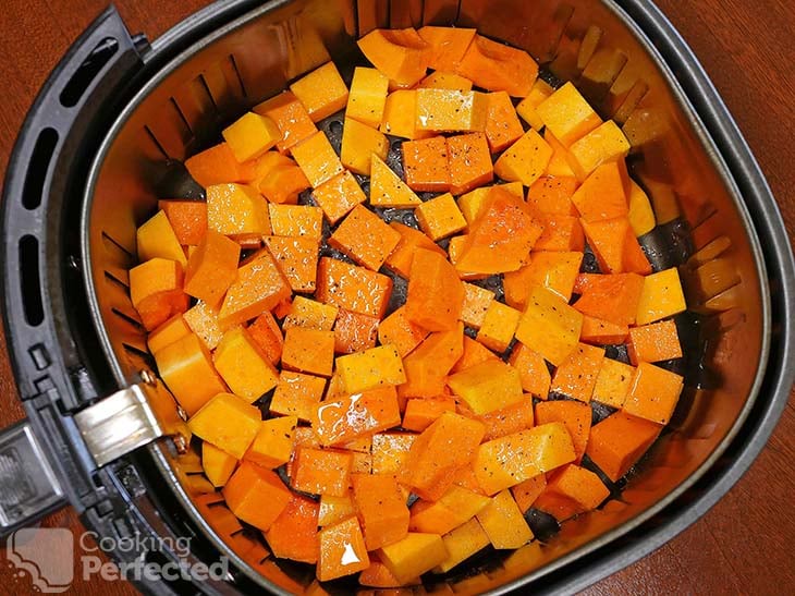 Seasoned pumpkin ready for cooking in the air fryer